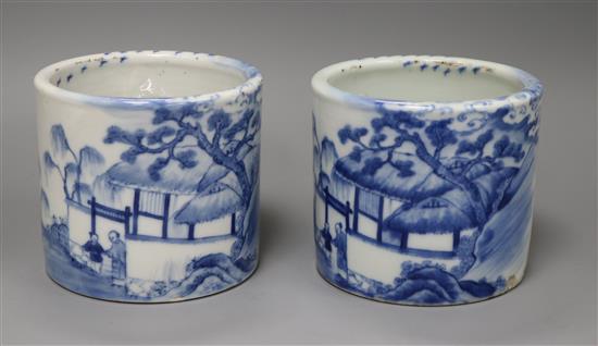 A pair of late 19th century Chinese blue and white brush pots height 11cm